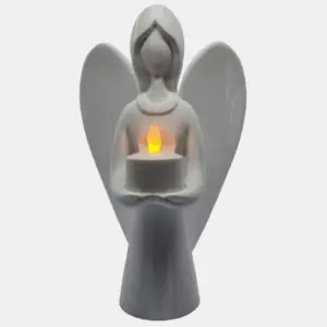 3D-printet engel der holder et elektrisk LED-fyrfadslys.